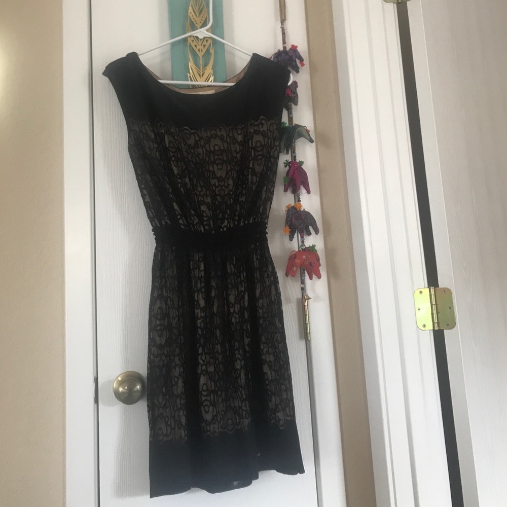Flattering waist cinching little black dress